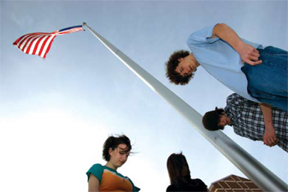 Students praying at the pole - large.jpg