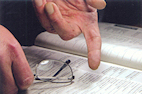 Hands reading Bible.jpg